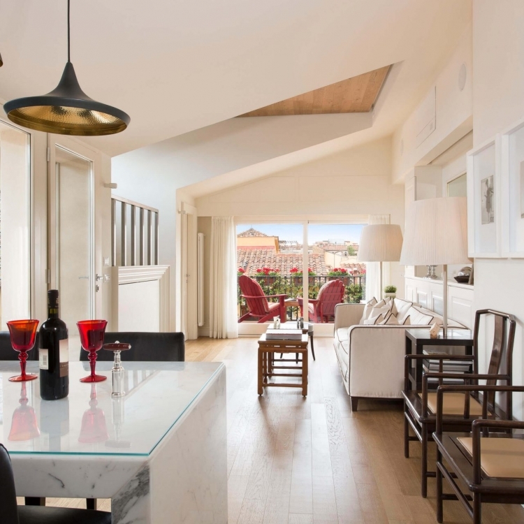 Marble kitchen counters. Open kitchen with view on living area. Direct access to terraces.
